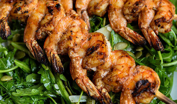 Shrimp Skewers over Lemon Arugula Salad